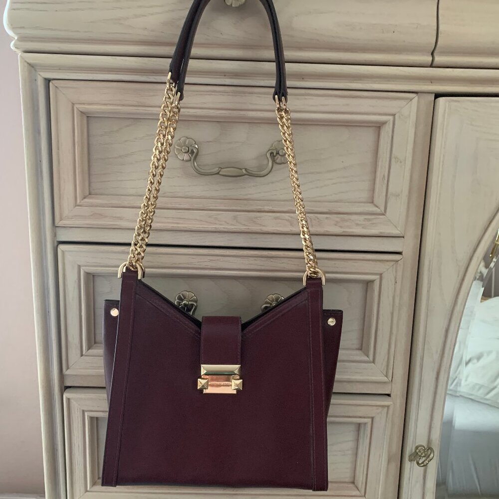Michael Kors burgundy purse w/gold metal trim